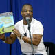 LeVar Burton reads from copies of his book The Rhino That Swollowed A Storm in 2014 in Austin, Texas. (Photo: Gary Miller/Getty Images)